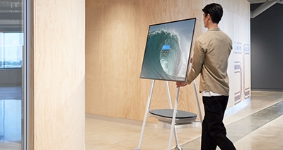 Man moving portable video station